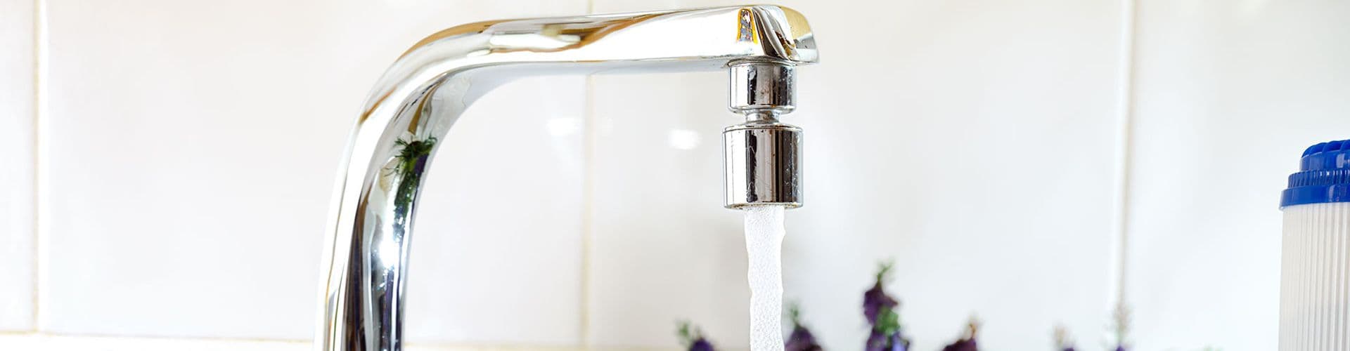 A running sink faucet.